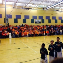John Paul the Great's fans stand during the National Anthem (Photo Courtesy of Higher Level Sports)
